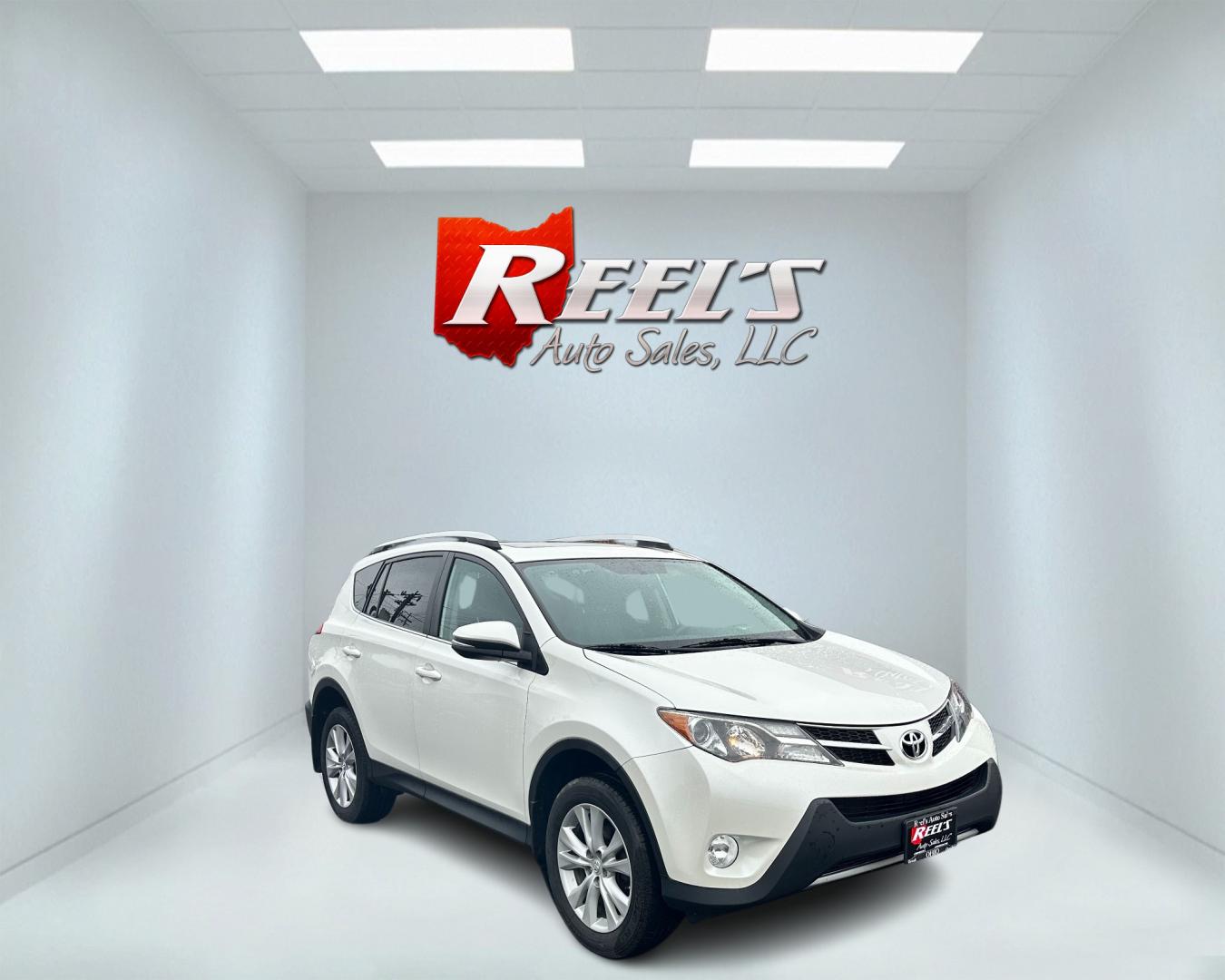 2013 White /Black Toyota RAV4 Limited (2T3DFREV1DW) with an 2.5L I4 DOHC 16V engine, 6-Speed Automatic transmission, located at 547 E. Main St., Orwell, OH, 44076, (440) 437-5893, 41.535435, -80.847855 - Photo#2